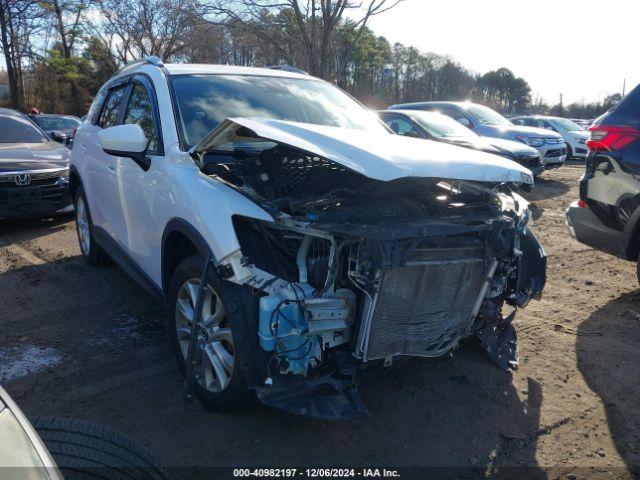  Salvage Mazda Cx