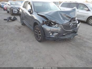  Salvage Mazda Cx