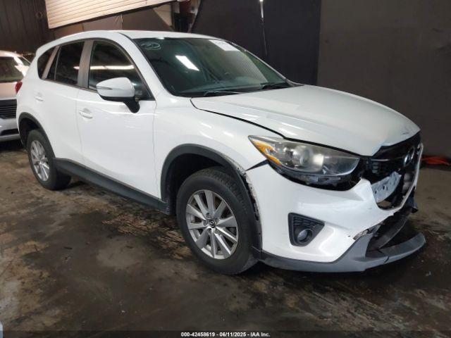  Salvage Mazda Cx