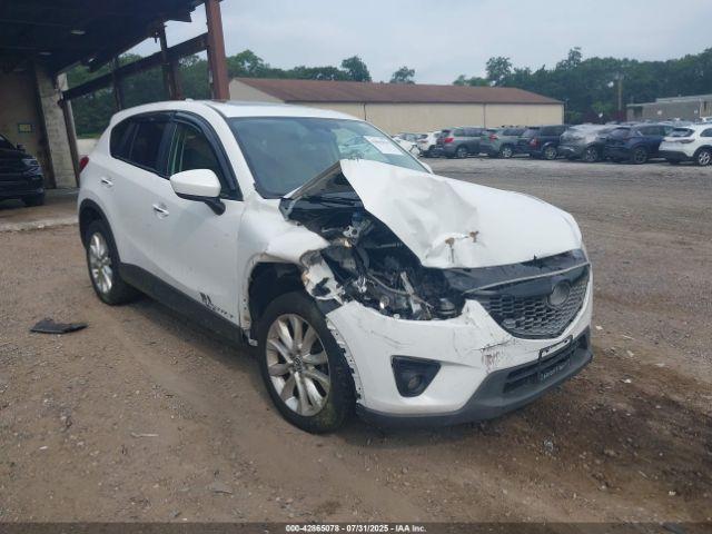  Salvage Mazda Cx